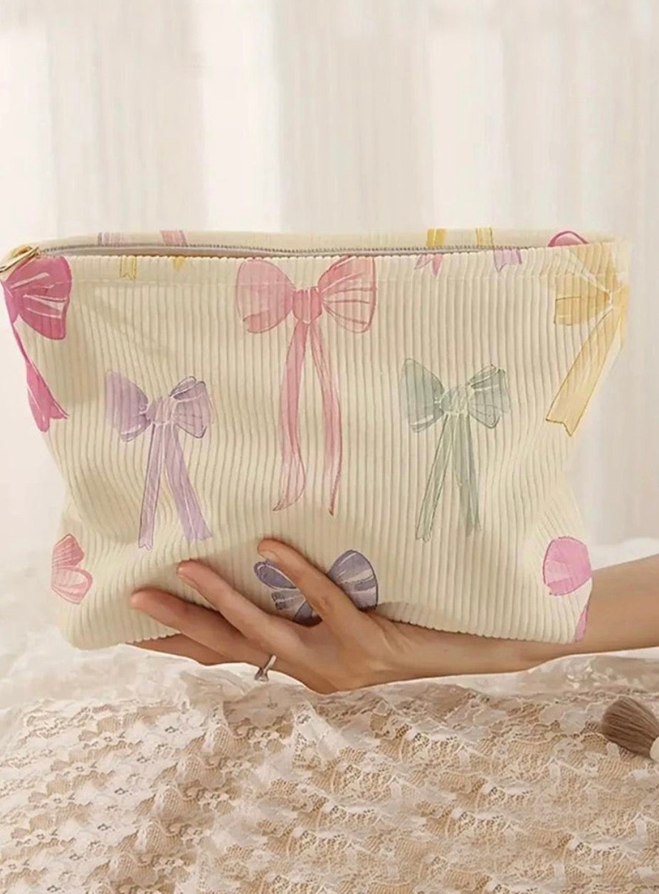 Bowknot pattern makeup cosmetic clutch bag